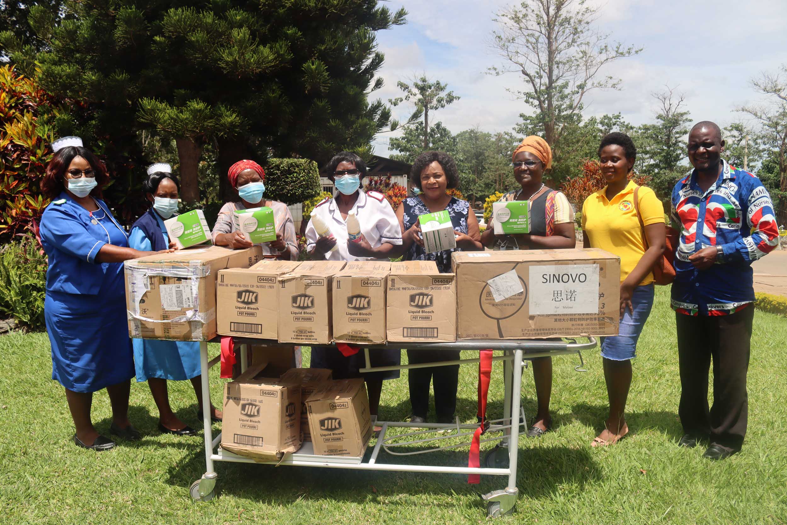 NONM and KCH delegates pose for a photo at the handover ceremony